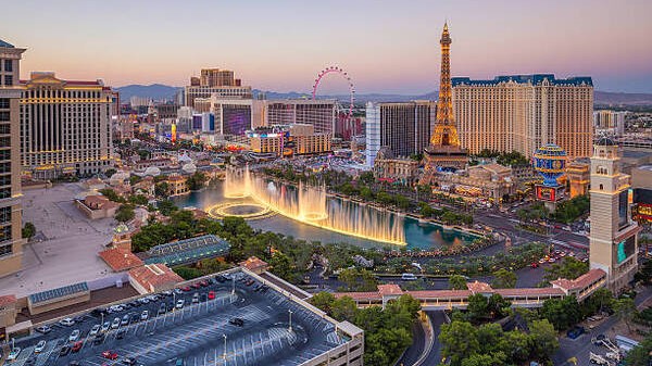 Industrial automation and a decrease in tourists impact Las Vegas: significant layoffs for dealers, the gambling industry moves forward amidst transformation pains.