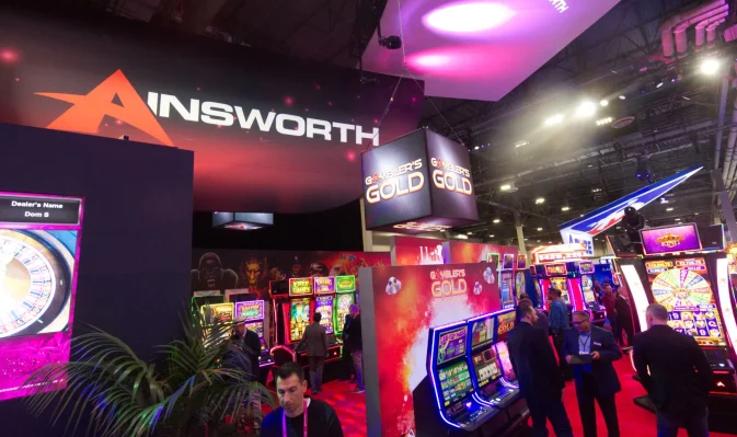 Ainsworth warns that profits will be halved in the second half of the year, with the North American market becoming a "drag".